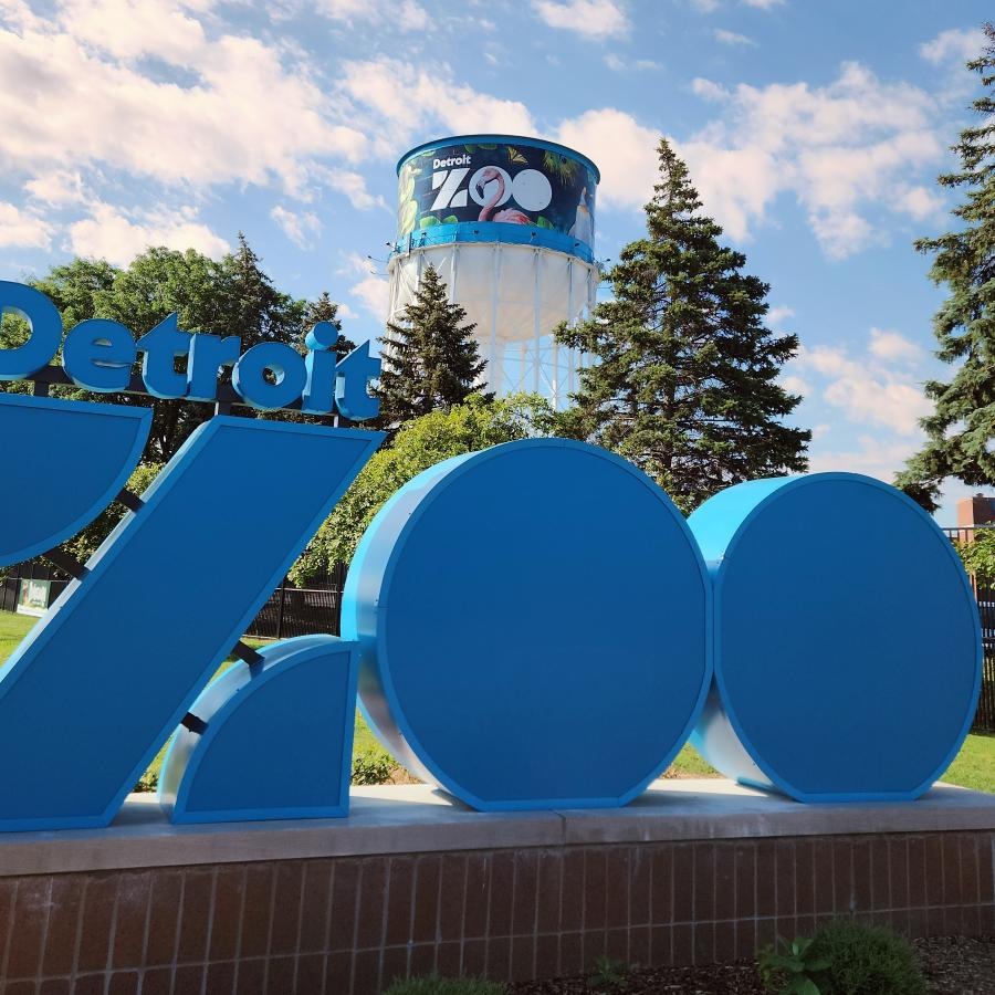 a sign with blue letters